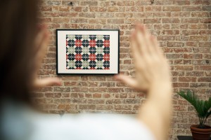 Woman Hanging Artwork